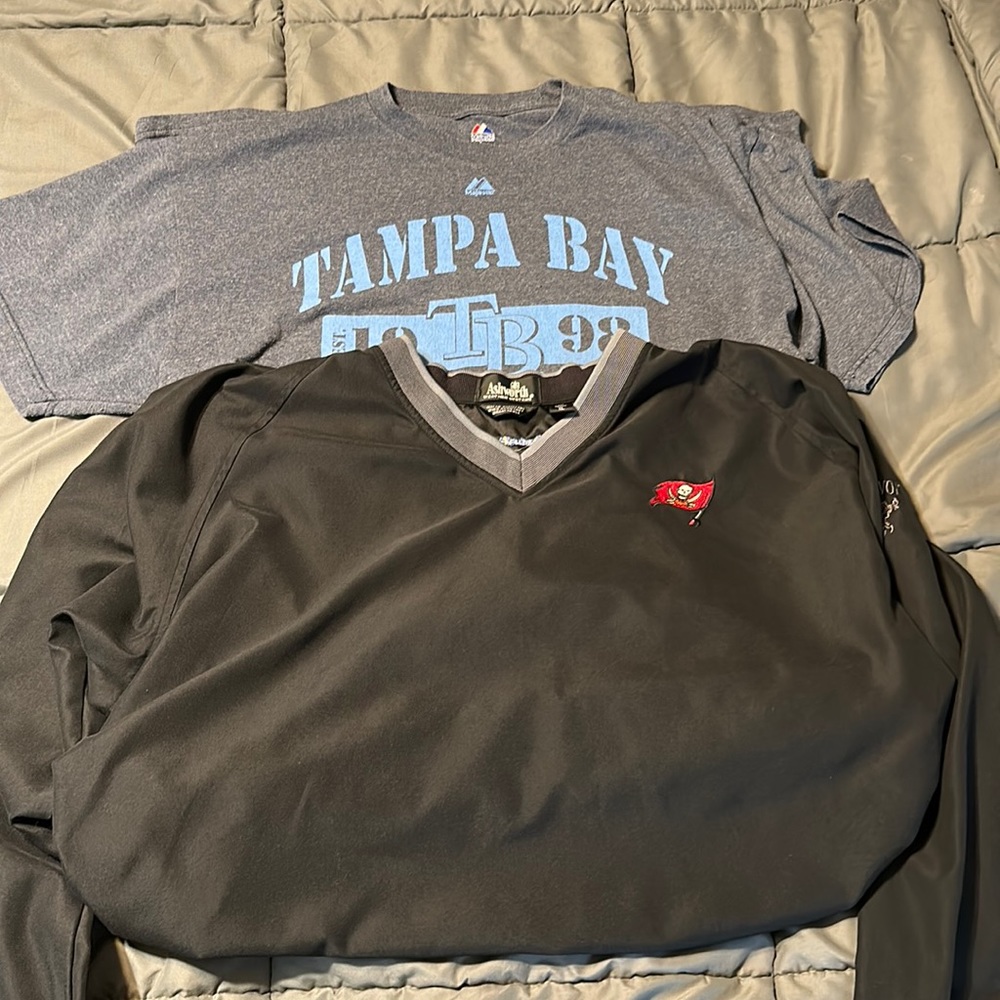 1 Tampa Bay Rays T-shirt XL. 1 Tampa _Bay Bucs Golf pullover XL.